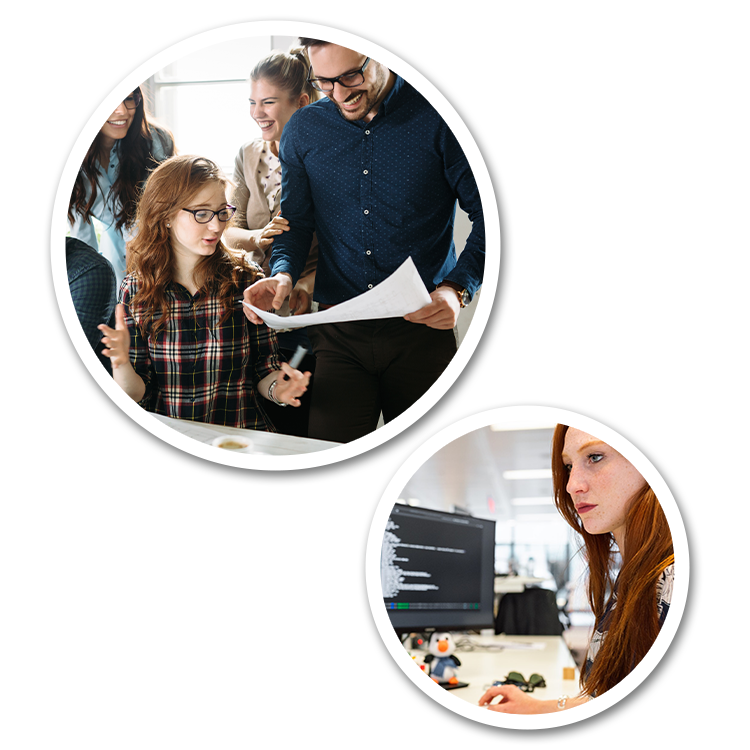 Laughing people looking at a document together and a young programmer working on a PC